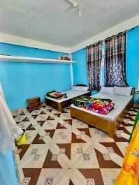 Double bed room at Awoochopa Homestay Dirang