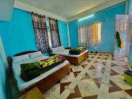 Twin bed guest room at Awoochopa Homestay Dirang